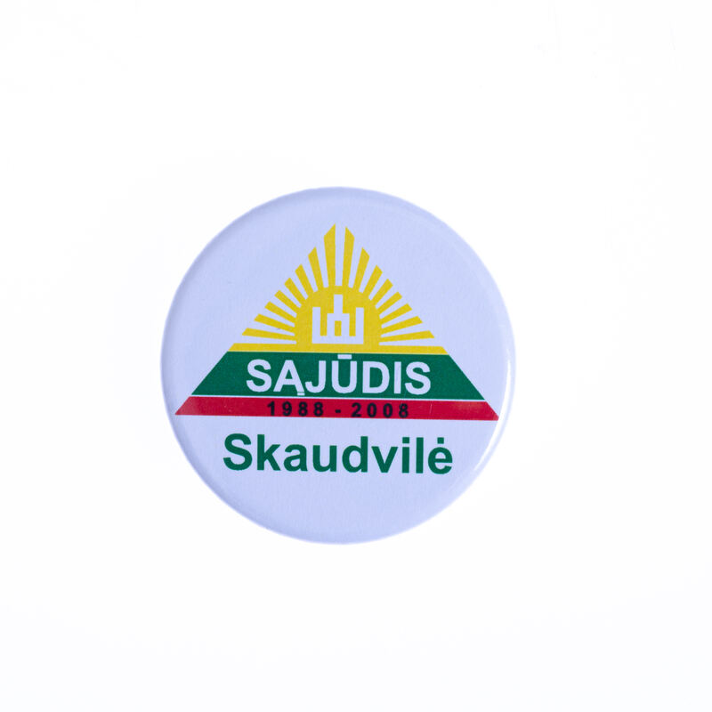 Sąjūdžio ženkliukas su Skaudvilės vietos grupės nuoroda.